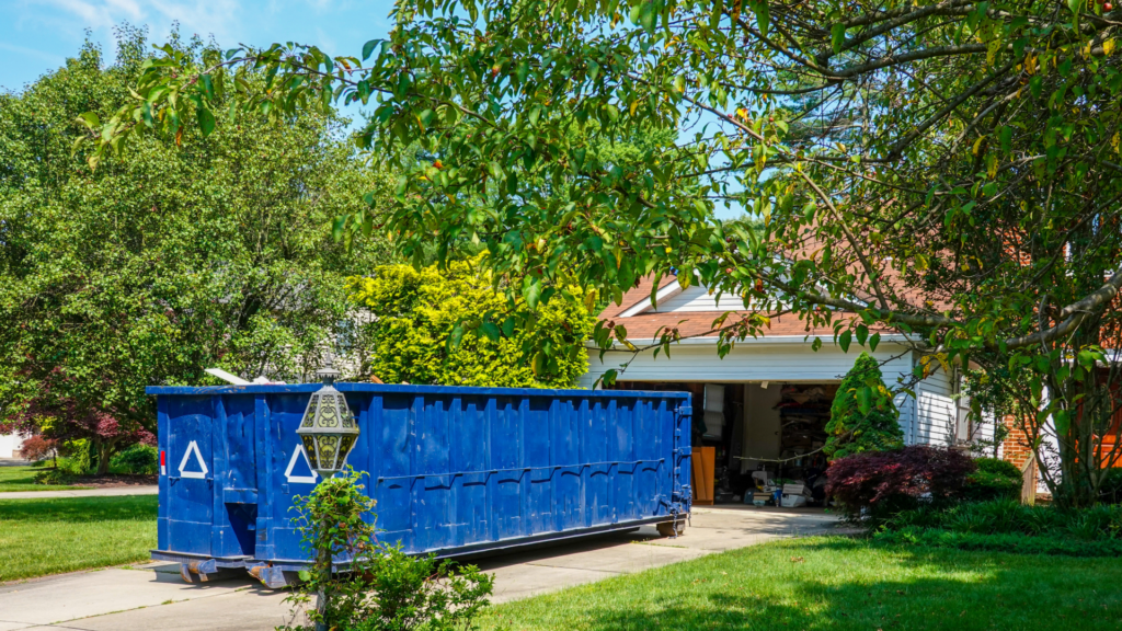 dumpster in a driveway